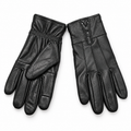Pair of men's black leather gloves showing wrist zip and palm