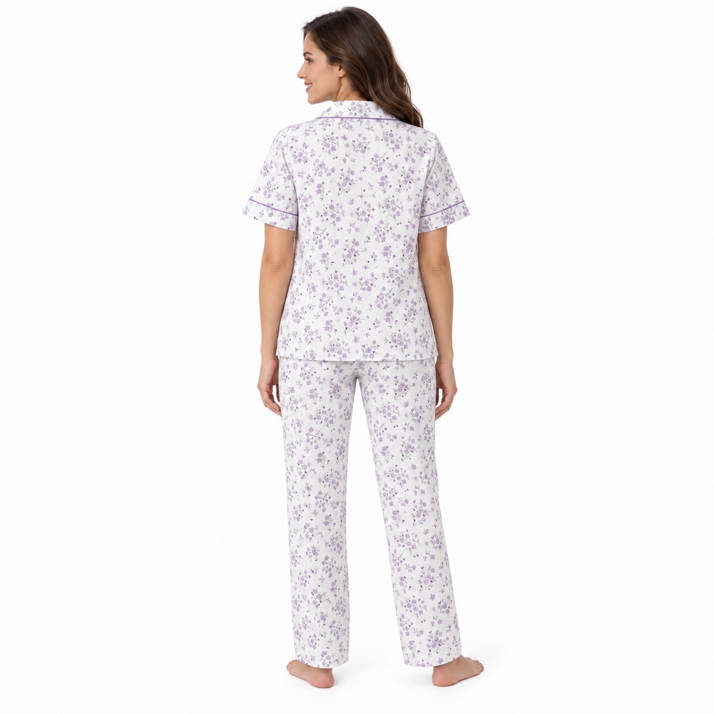 Back view of the lilac floral short-sleeve pyjama shirt and full-length trousers