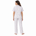 Back view of the lilac floral short-sleeve pyjama shirt and full-length trousers
