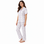 Side view of the lilac floral pyjama shirt and straight-leg trousers