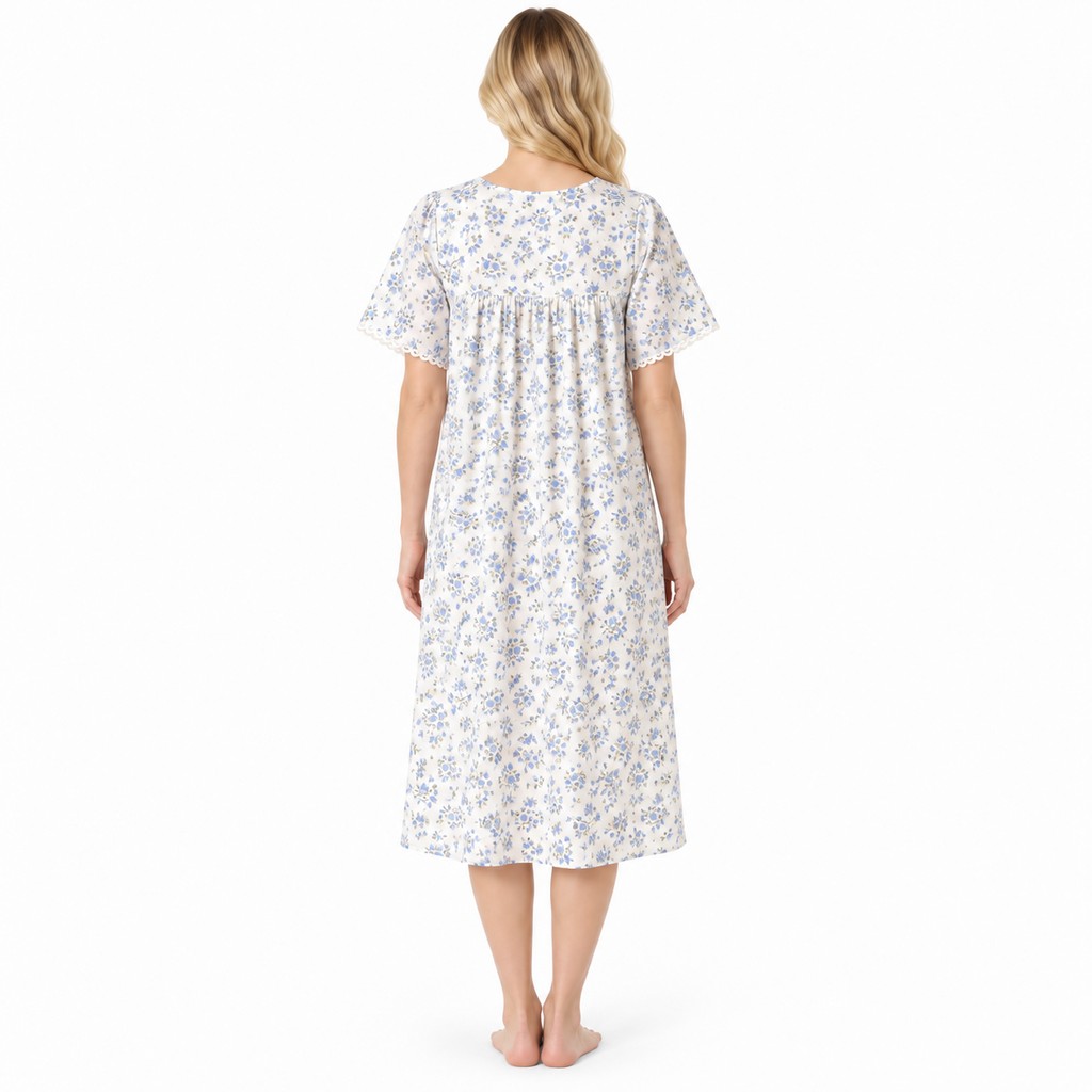 Rear view of the blue floral short-sleeve nightdress showing its relaxed fit and below-knee hem