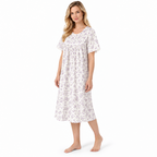 Three-quarter view of the lilac floral nightdress with lace-trimmed short sleeves