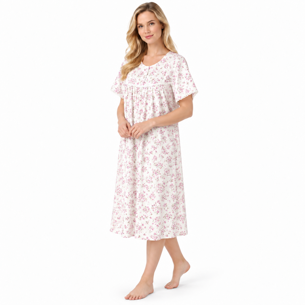 Three-quarter view of the pink floral nightdress showing lace-trimmed short sleeves