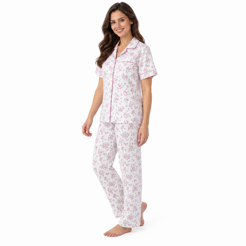 Side view of the pink floral pyjama shirt and straight-leg trousers