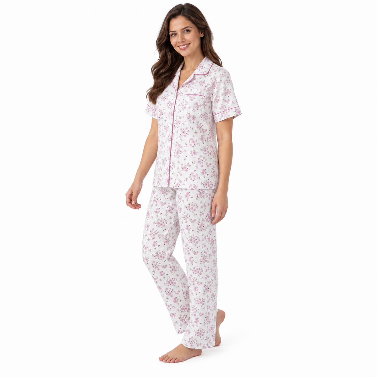 Side view of the pink floral pyjama shirt and straight-leg trousers